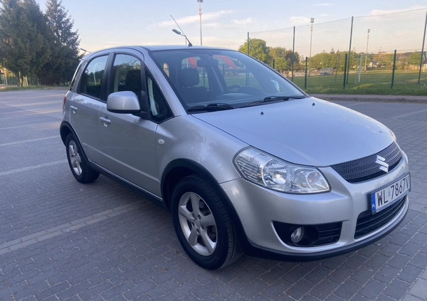 Suzuki SX4 cena 21900 przebieg: 156500, rok produkcji 2010 z Legionowo małe 232